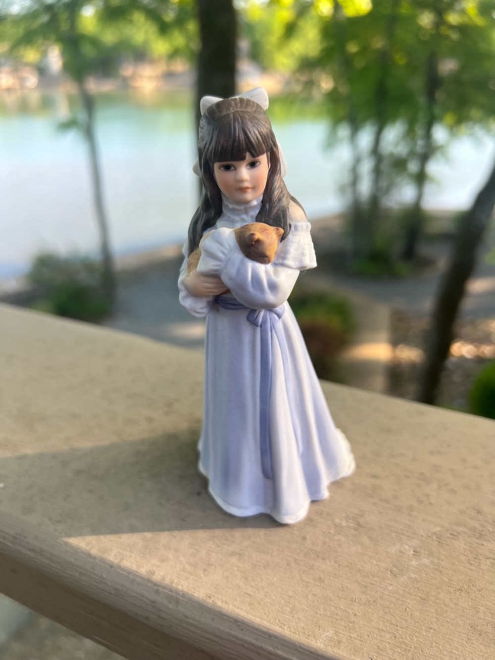 Porcelain Girl Figurine in Light Purple Dress Holding Small Animal